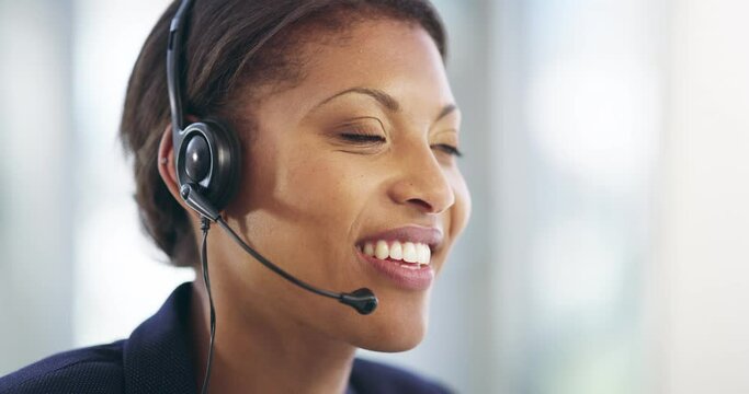 I'm glad I could help. Attractive young happy confident female support center agent wearing a headset and working on a desktop in her office, speaking to customers to solve problems and give solutions