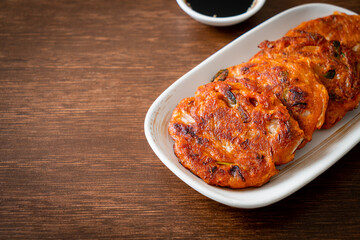 Korean Kimchi pancake or Kimchijeon - Fried Mixed Egg, Kimchi, and Flour