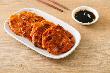 Korean Kimchi pancake or Kimchijeon - Fried Mixed Egg, Kimchi, and Flour