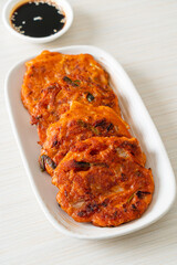 Korean Kimchi pancake or Kimchijeon - Fried Mixed Egg, Kimchi, and Flour