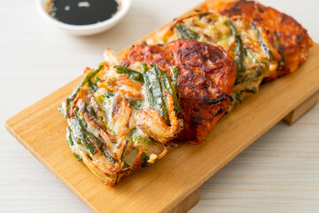 Pajeon or Korean pancake and Korean Kimchi pancake or Kimchijeon on white background