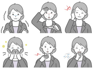 風邪の症状が出ているスーツの高齢女性