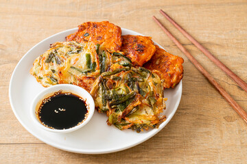 Pajeon or Korean pancake and Korean Kimchi pancake or Kimchijeon on white background