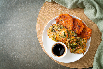Pajeon or Korean pancake and Korean Kimchi pancake or Kimchijeon on white background
