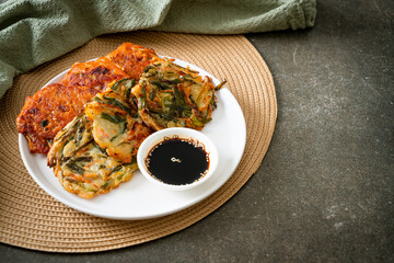 Pajeon or Korean pancake and Korean Kimchi pancake or Kimchijeon on white background