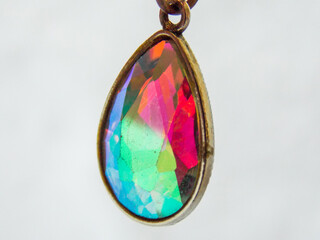 Rainbow topas pendant in close-up