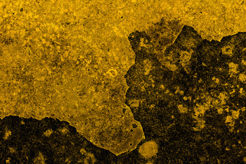 Destroyed dark yellow color concrete wall surface for texture