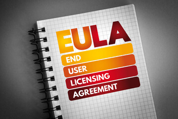 EULA - End User Licensing Agreement acronym on notepad, technology concept background