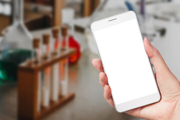 Historic old pharmacy bottles, laboratory beakers on a dark wooden table. Ancient medical laboratory. Drug ?reation