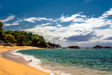 Sea surf on the beach of Santa Cristina in Lloret de Mar
