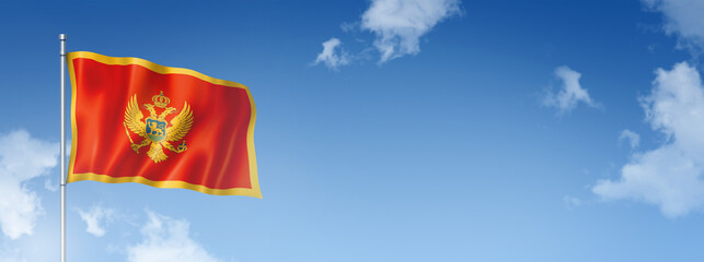 Montenegro flag isolated on a blue sky. Horizontal banner