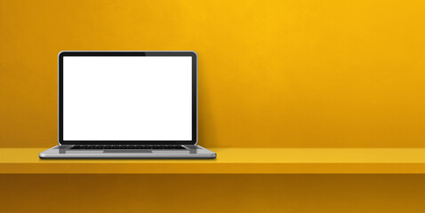 Laptop computer on yellow shelf background banner