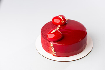 Red mirror half glazed and velor entremets with mini hearts and gold.