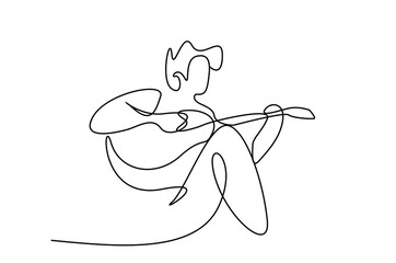 a young male sitting on his lap playing the guitar and having fun