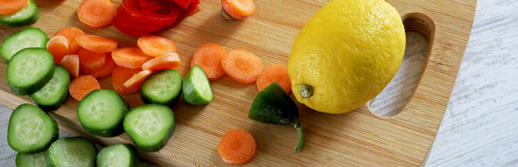 fruits and vegetables on wooden chopper table