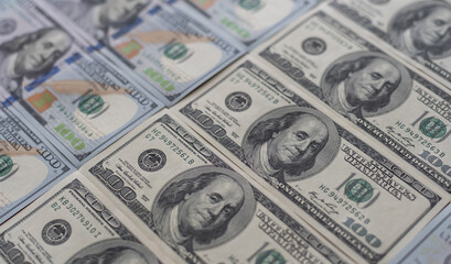 Background from 100 dollar bills. Wealth and success concept.