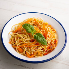 Spaghetti with carrot and vegetables. Traditional Italian recipe.
