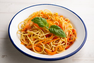 Spaghetti with carrot and vegetables. Traditional Italian recipe.