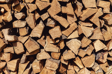 chopped firewood lying in a pile