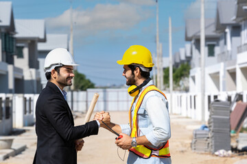Engineer man handshake with businessman after finishing up meeting in construction site,Hand shake...