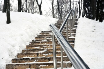 stairs in winter forest