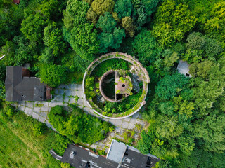 Abandoned old military building, photographed with a drone while nature is slowly taking it back