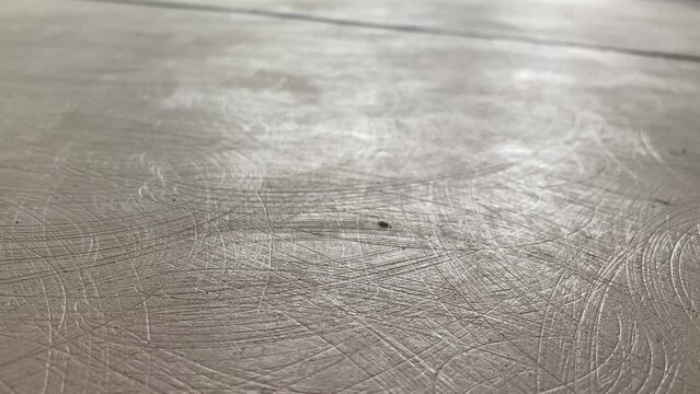 Floor grinding for decorative microcement finishing