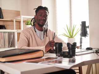Graphic designer photographer working in home office