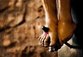 jesus christ  feet/hand detail on cross