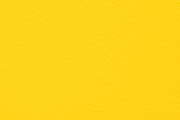 Yellow concrete wall texture background.  Yellow paint colour cement background. 