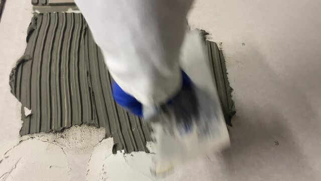 Laboratory test for the quality of tile adhesive.