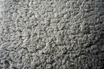 Weißes Lammwollkissen 