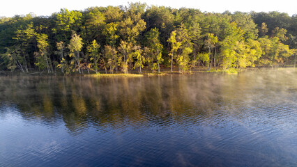 Lake with a tree lined bank