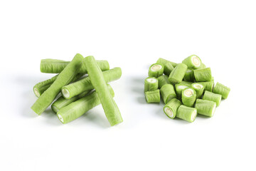 Long beans on a white background close-up photo of green vegetables. It's a kind of nut. It can be eaten raw as a side dish