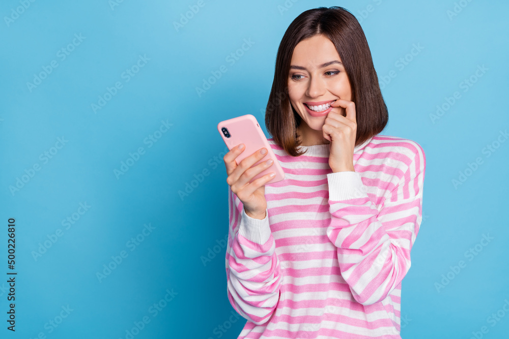 Sticker photo of cute young brunette lady look telephone wear striped pullover isolated on blue background