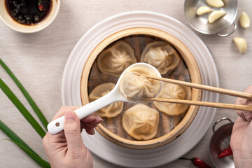 Steamed pork soup dumplings named Xiao long bao xiaolongbao in Taiwan.