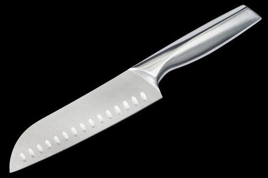 Studio shot of Stainless Steel Santoku kitchen knife, isolated on black background.