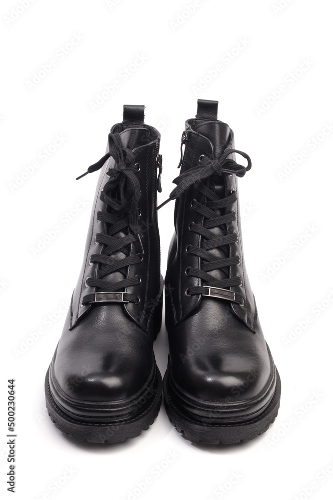 Wall mural black winter boots on white background - Image