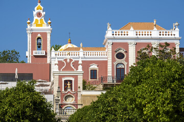 details of a tower and facades of the Estoi palace in Estoi, district of Faro, Algarve, Portugal