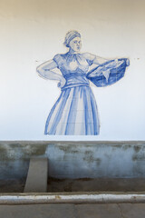 decoration of a washhouse covered with azulejos in Estoi, Faro, Algarve, Portugal