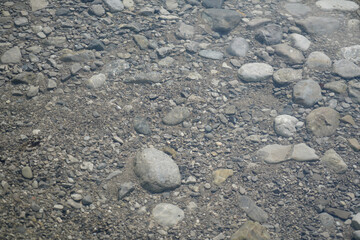 Splashing water with drops in bright colors and shapes Photographed in the studio