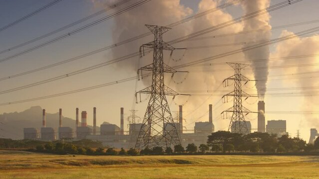 Time lapse video 4K motion, Industrial landscape, coal-fired power plants smoke, industrial pollution causes atmospheric pollution and environmental problems, eco industrial scene.