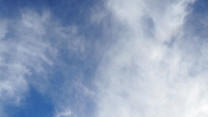 background of blue sky with clouds in clear weather