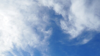 background of blue sky with clouds in clear weather