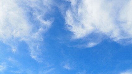 background of blue sky with clouds in clear weather