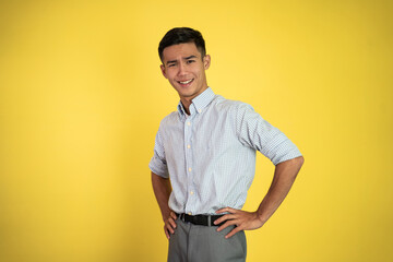 asian young businessman with serious expression crossed his arm and standing over isolated...