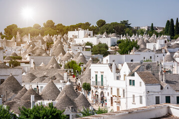 Alberobello town in Italy, famous for its hictoric trullo houses - obrazy, fototapety, plakaty
