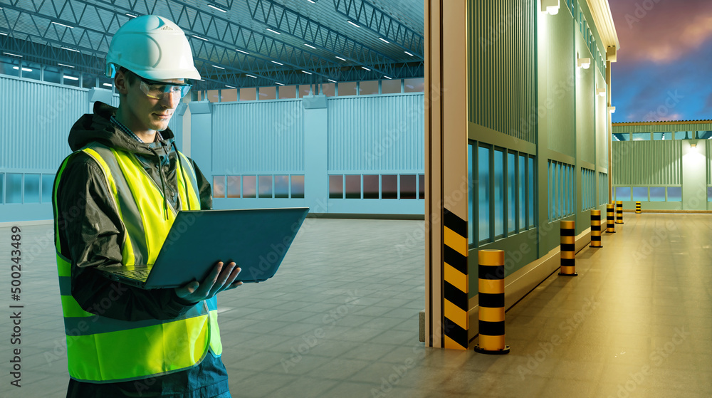 Poster warehouse design. man with laptop next to empty warehouse. builder stands with computer in his hands