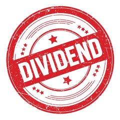 DIVIDEND text on red round grungy stamp.