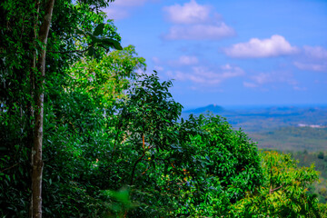 The background of the sea by the evening sea, with natural beauty (sea water, rocks, sky) and fishermen are fishing by the river bank, is a pleasure during travel.
